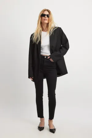 Skinny High Waist Raw Hem Jeans - Trendy & Edgy