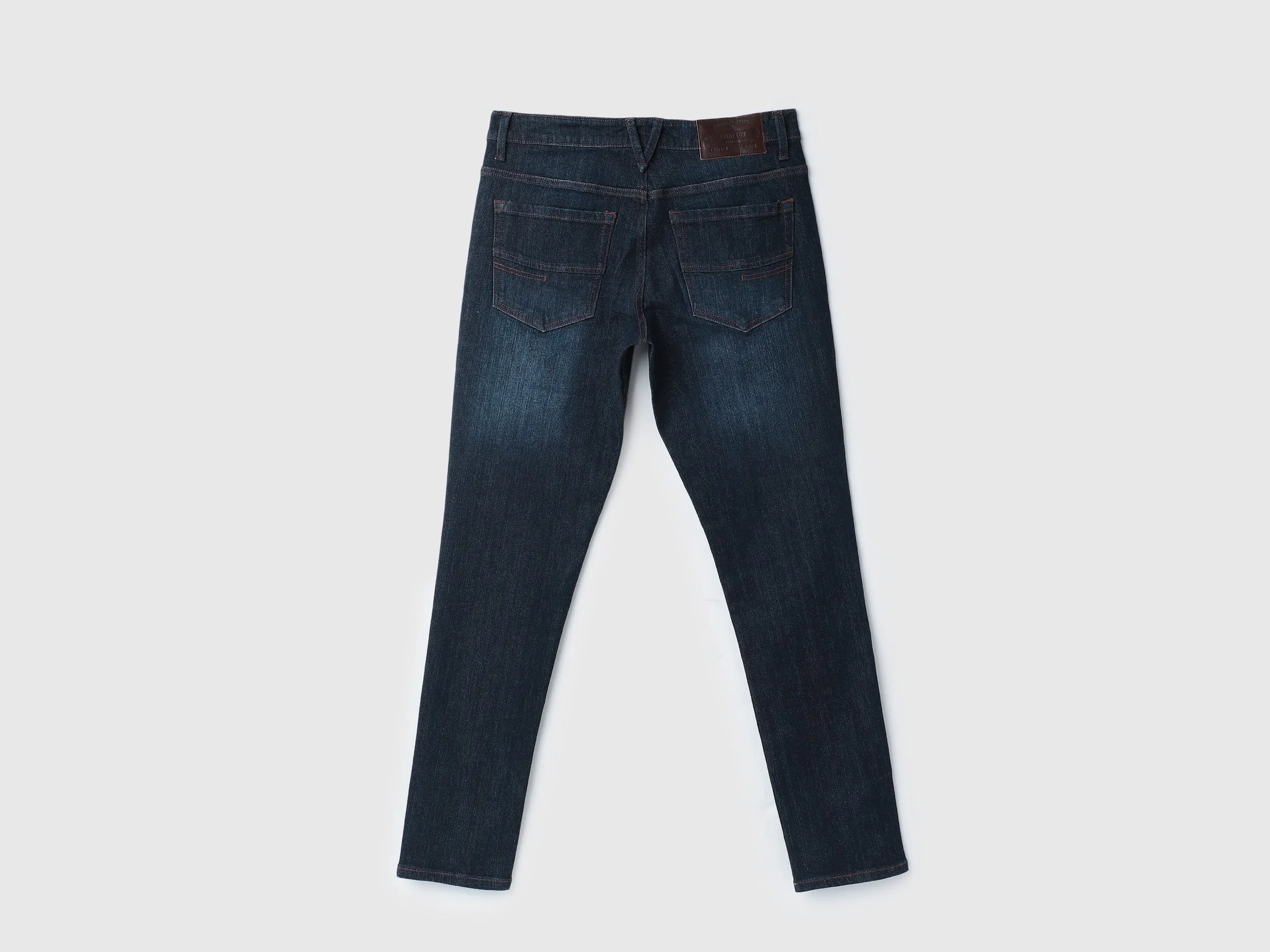 Solid Mid Rise Slim Tapered Fit Jeans