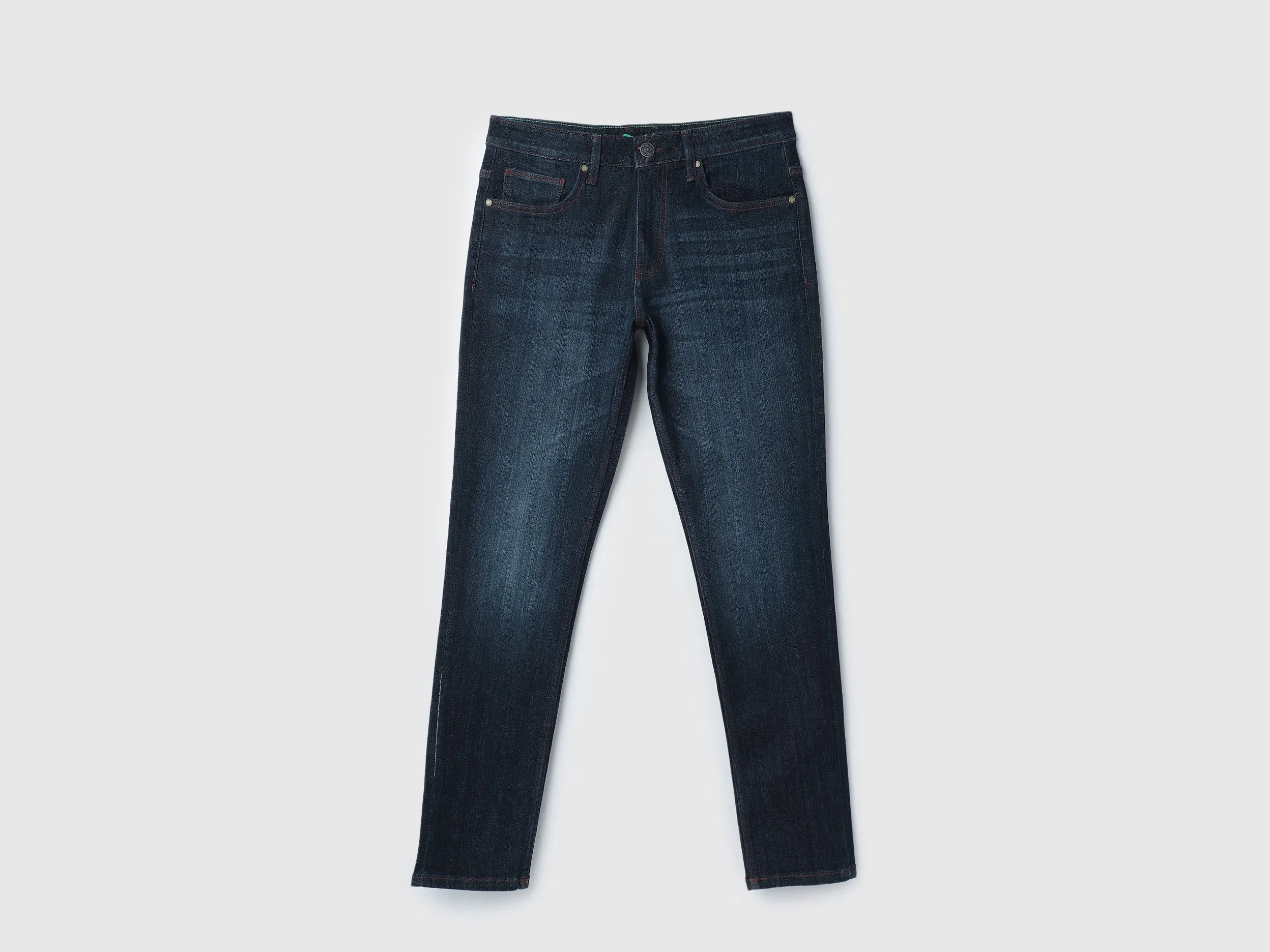 Solid Mid Rise Slim Tapered Fit Jeans