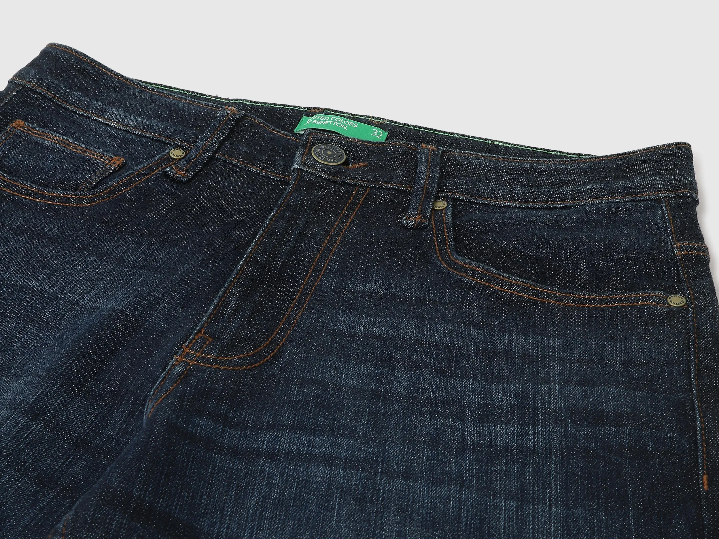 Solid Mid Rise Slim Tapered Fit Jeans