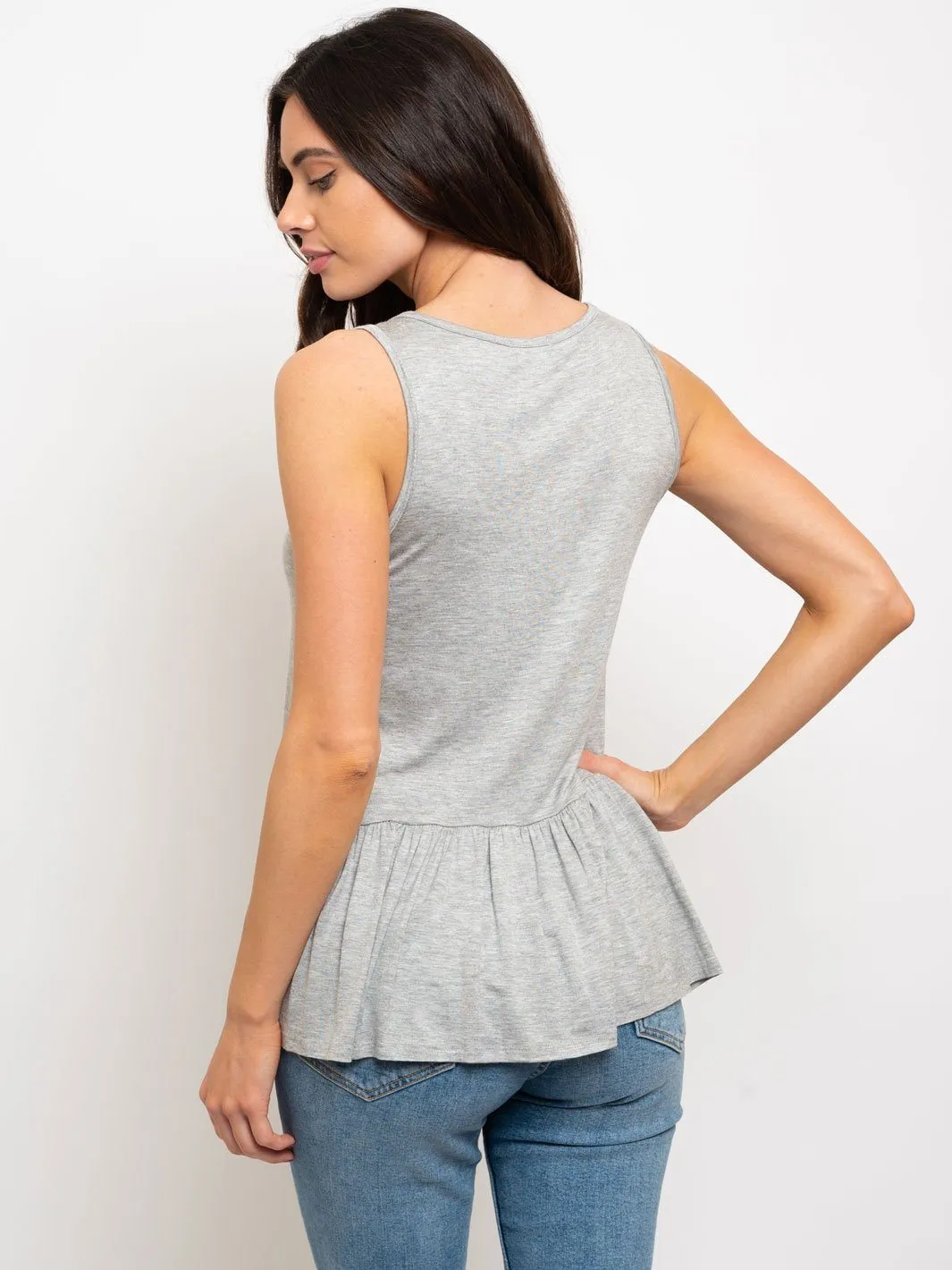 WOMEN'S CROSS NECK PEPLUM TOP