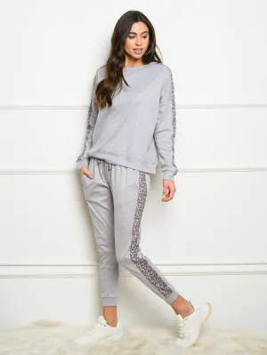 WOMEN'S LONG SLEEVE ANIMAL PRINT DETAIL TOP