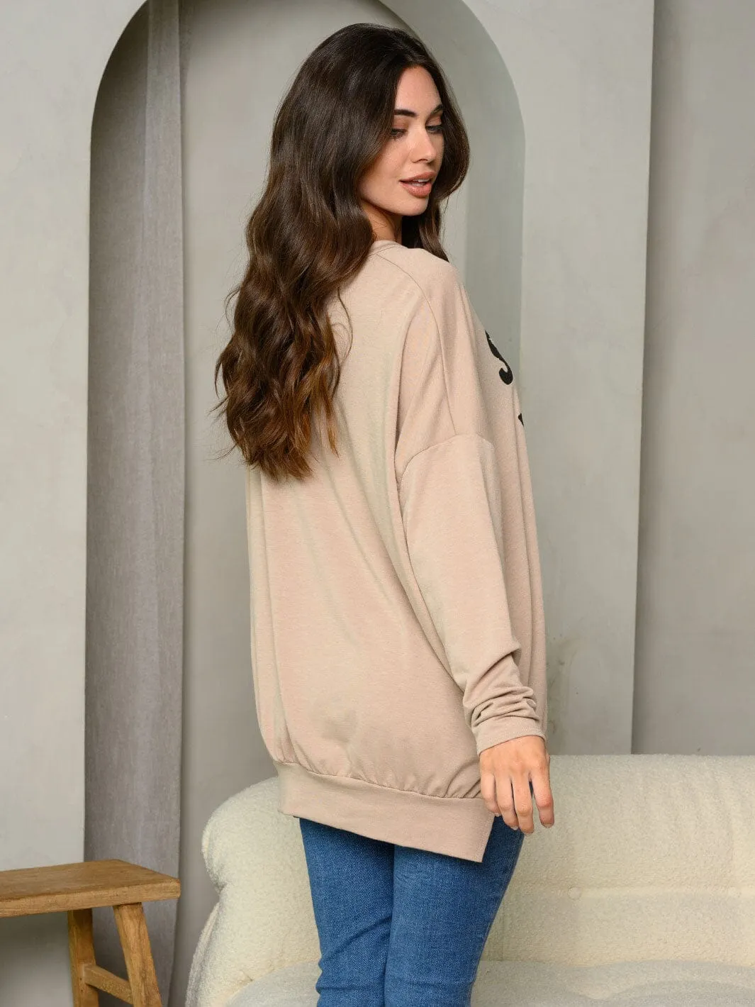 WOMEN'S LONG SLEEVE GRAPHIC TOP